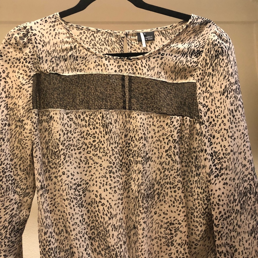 Sparkle and fade animal print top